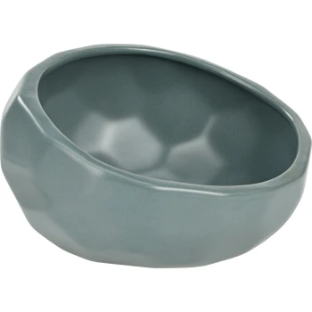 Un bol de nourriture pour animaux de compagnie moderne et texturé de couleur bleu-vert doux, présentant une forme organique unique et un intérieur lisse.