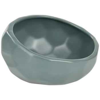 Un bol de nourriture pour animaux de compagnie moderne et texturé de couleur bleu-vert doux, présentant une forme organique unique et un intérieur lisse.