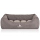 Graues Haustierbett mit plüschigem Innenraum und erhöhten Seiten, mit dem Logo 'KNUFFELWUFF' auf der Vorderseite.