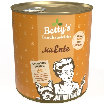 Dose Hundefutter "Betty's Landhausküche Mit Ente" mit Illustrationen von Koch und Hund, die "extra viel Fleisch" und getreidefrei angeben.