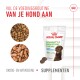 Royal Canin puppy supplementen zak gelabeld 'Immuniteit & Spijsvertering Kauwtabletten' met een hond, brokjes en kauwtabletten. Tekst in het Nederlands over voeding.