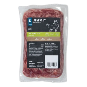 Vakuumversiegelte 400 g LIEBESGUT 'BARF-Menü Ziege' Rohfutterpackung mit schwarzem Etikett, Ziegenillustration und deutschem Text