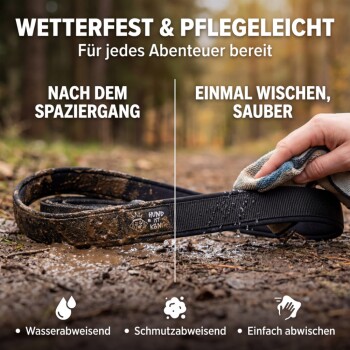 Schwarze Hundeleine mit einem stabilen Design, mit einem großen Griff und einem Karabinerclip, beschriftet mit 'Hund ist König'.
