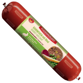 Fleischeslust Futterbox (Natürlich & Artgerecht) mit Welpenbild und Wurstpackung beschriftet 'Kaninchen mit Rind / Rabbit with beef'