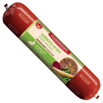 Fleischeslust Futterbox (Natürlich & Artgerecht) mit Welpenbild und Wurstpackung beschriftet 'Kaninchen mit Rind / Rabbit with beef'