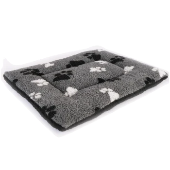 Gray pet bed with a soft, fluffy texture, featuring black and white paw print patterns.