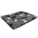 Gray pet bed with a soft, fluffy texture, featuring black and white paw print patterns.