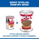 Puszki karmy Hill's Science Plan dla dorosłych z indykiem (stary i nowy design), z napisem 'NOWY WYGLĄD, ŚWIETNY SMAK' oraz 'W tym okresie możesz otrzymać produkt o różnym wyglądzie.'