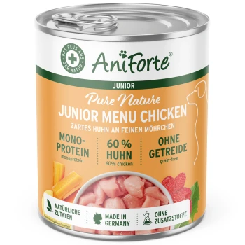 Eine Dose PureNature JuniorMenu Nassfutter für Hunde mit einem Hundegrafik, die Huhn, Karotten und Himbeeren zeigt. 400 g, gluten- und getreidefrei.