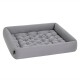 Graues Hundebett mit gestepptem Design und erhöhten Rändern, ideal für Hunde oder Katzen, vor einem weißen Hintergrund präsentiert.