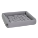 Graues Hundebett mit gestepptem Design und erhöhten Rändern, ideal für Hunde oder Katzen, vor einem weißen Hintergrund präsentiert.