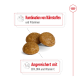 Hundefutter-Kibble-Stücke mit dem Text, der "Kombination von Nährstoffen und Vitaminen" und "Angereichert mit EPA, DHA und Vitamin C" hervorhebt.