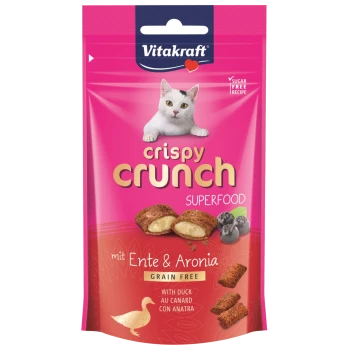 Verpackung von Crispy Crunch Superfood Katzenleckerlis mit pinkem Hintergrund, knusprigen Leckerlis, Heidelbeeren und dem Text "mit Ente & Aronia, getreidefrei".
