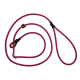 Rosa Seil-Schlupfleine mit Metallring und gleitendem Stopper, auf schwarzem Hintergrund aufgewickelt.