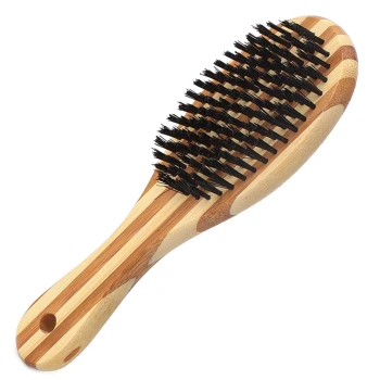 Bambus-Haustierbürste mit schwarzen Borsten, mit einem glatten Griff und gestreiftem Design. Ideal zum Grooming von Haustieren.