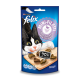 Felix Mini-Filetti Katzenleckerlis Verpackung zeigt eine verspielte schwarz-weiße Katze mit dem Text "90% Fleisch" und "Huhn & Ente".