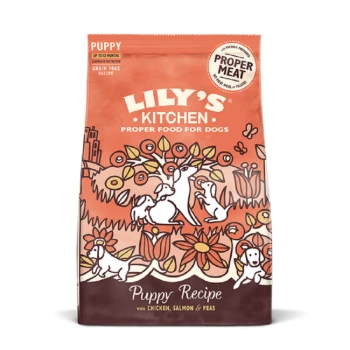 Lily's Kitchen Puppy Recipe dog food bag with colorful dog and flower illustrations, labeled "Grain Free Recipe" and "Proper Meat."