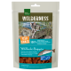Real Nature Wilderness Fish Snack package with wild salmon treat for cats, featuring a playful cat on a rocky shore. Text: "100% ALASKA WILD SALMON."