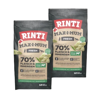 Zwei Beutel Rinti Max-I-Mum Fresh Hundefutter, jeweils mit "70% Fleisch & Innereien" und "12 Kilo Gramm" auf der Verpackung.