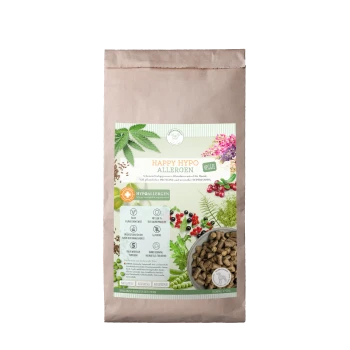 Braune Papiertüte mit "Happy Hypo Allergen" veganem Hundefutter, mit einer Schüssel Trockenfutter, auf der Zutaten und Nährwertangaben angezeigt werden.