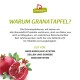 Granatapfelbild mit Text über seine Vorteile für Haustiere, der die positiven Effekte von Ellagsäure auf Herz, Zellen und Immunität betont.