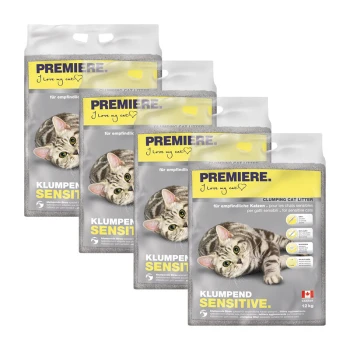 Sensitive clumping litter 4x12 kg Four bags of PREMIERE clumping cat litter, labeled "KLUMPEND SENSITIVE," featuring a gray tabby cat on the front, with text in German and English.