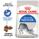 Royal Canin Indoor 27 cat food bag featuring a stretching cat illustration, with text highlighting "Health Nutrition" and "Stool odour reduction."