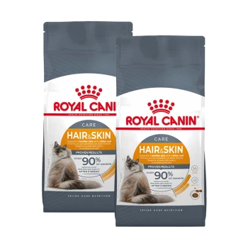 Zwei Taschen Royal Canin Hair & Skin Katzenfutter, mit einer Katze auf der Vorderseite, mit Text, der die Unterstützung für gesunde Haut und glänzendes Fell hervorhebt.