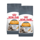 Deux sacs de nourriture pour chats Royal Canin Hair & Skin, présentant un chat sur le devant, avec un texte mettant en avant le soutien pour une peau saine et un pelage brillant.