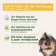 Ein glücklicher Hund, der sich die Lippen leckt, mit Text über die Vorteile eines 100% natürlichen Verdauungsprodukts für die Darmgesundheit und Stuhlkonsistenz.
