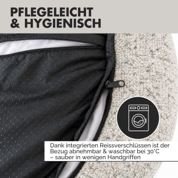 Ein hellbeiges rundes Hundebett mit gepolstertem Rand und einem schlafenden Französischen Bulldoggen. Text: "Gemütliche Sicherheit" und "Runde Donut-Form."