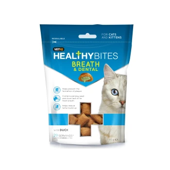 VETIQ Healthy Bites for cats, featuring a gray cat on the bag, helps prevent plaque and tartar with duck, parsley, and clove oil.