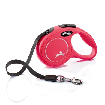 A bright pink retractable dog leash with a black strap and silver clip, featuring a silhouette of a dog and the text "CLASSIC" and "MADE IN GERMANY."