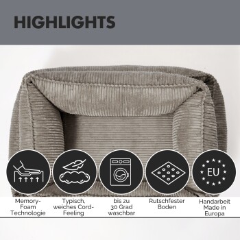 Graues Haustierbett mit abnehmbarem Bezug, mit gerippter Textur und integrierten Reißverschlüssen für einfaches Waschen. Text: "Abziehbar & waschbar."