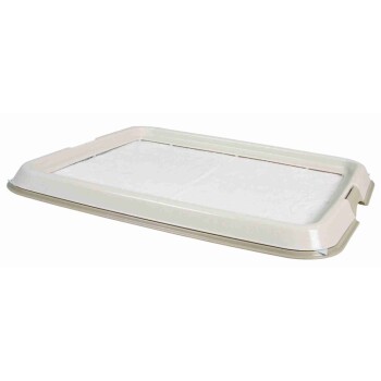 Ein beiger Halter für Haustiertrainingpads mit einem weißen saugfähigen Pad darin, entworfen für die Verwendung in Innenräumen.