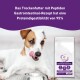 Hund leckt sich die Lippen neben einer Tüte Wildfang Gastrointestinal Trockenfutter mit 95 % Proteinverdaulichkeit, Text auf Deutsch.