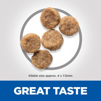 Five round kibble pieces displayed on a light background, with text stating "Kibble size approx. 4 x 7.5mm" and "GREAT TASTE."