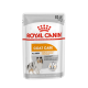Torebka karmy dla psów Royal Canin Coat Care, 85g, z jasnym wzorem i ilustracją psa, oznaczona dla wszystkich rozmiarów.