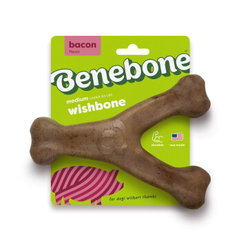 A durable, brown dog chew toy shaped like a bone, featuring the embossed text "Gumbo Bone" on its side.