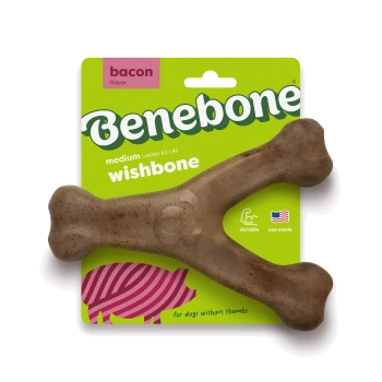 A durable, brown dog chew toy shaped like a bone, featuring the embossed text "Gumbo Bone" on its side.