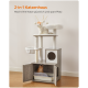 2-in-1 Katzenhaus mit einer weißen Katze auf der oberen Plattform und einer orangefarbenen Katze im unteren Bereich neben der Katzentoilette.