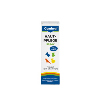 Canina Haut-Pflege Spray Schachtel, weiß mit bunten Haustiersilhouetten; Text: „HAUT-PFLEGE SPRAY“, „MIT SILBER“, „FÜR ALLE HEIM- & HAUSTIERE“.