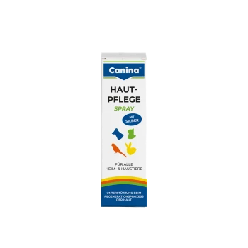 Canina Haut-Pflege Spray Schachtel, weiß mit bunten Haustiersilhouetten; Text: „HAUT-PFLEGE SPRAY“, „MIT SILBER“, „FÜR ALLE HEIM- & HAUSTIERE“.