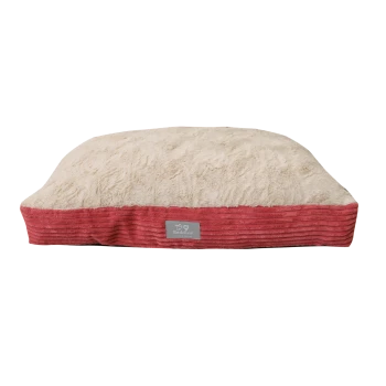 A plush pet bed with a soft cream top and a textured red striped border, featuring a gray label that reads "Beddies."