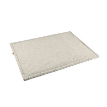 Eine weiche, beige Tiermatte mit plüschiger Textur und genähten Kanten, entworfen für den Komfort von Haustieren.