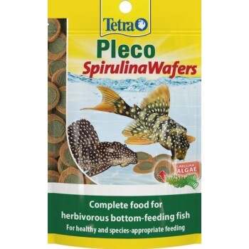 Tetra Pleco Spirulina Wafers package with two bottom-feeding fish illustrations and text: "Complete food for herbivorous fish."