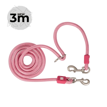 Rosa 3‑m-Seil-Hundeleine, aufgewickelt mit Metallkarabinern und verstellbarer Schlaufe; runde 'NEW 3m'-Plakette.