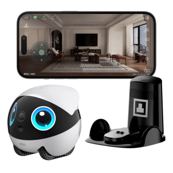 Ebo Haustierkamera-Roboter mit großen Augen, Ladestation und Smartphone, das eine Wohnzimmeransicht und Steuerung anzeigt.