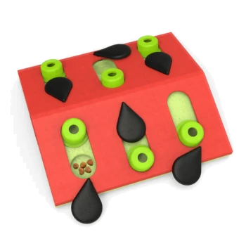 Interaktives Haustierpuzzle-Spielzeug in Rot und Grün, mit Löchern zum Verstecken von Leckereien, entworfen, um die geistige Aktivität von Haustieren zu stimulieren.