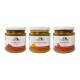Trois bocaux de nourriture pour animaux Tackenberg : bouillon de gibier, soupe de carottes et bouillon de bœuf, avec couvercles blancs et étiquettes rouges.